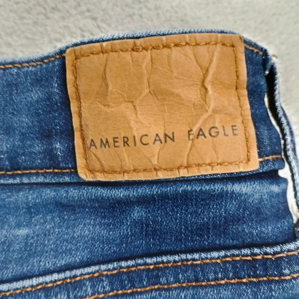 American Eagle Women Distressed Denim Shorts Blue 12 Next Level Stretch